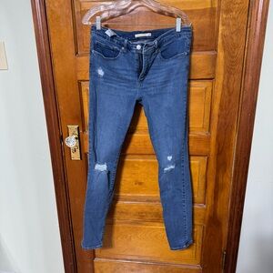 Distressed Blue Jeans